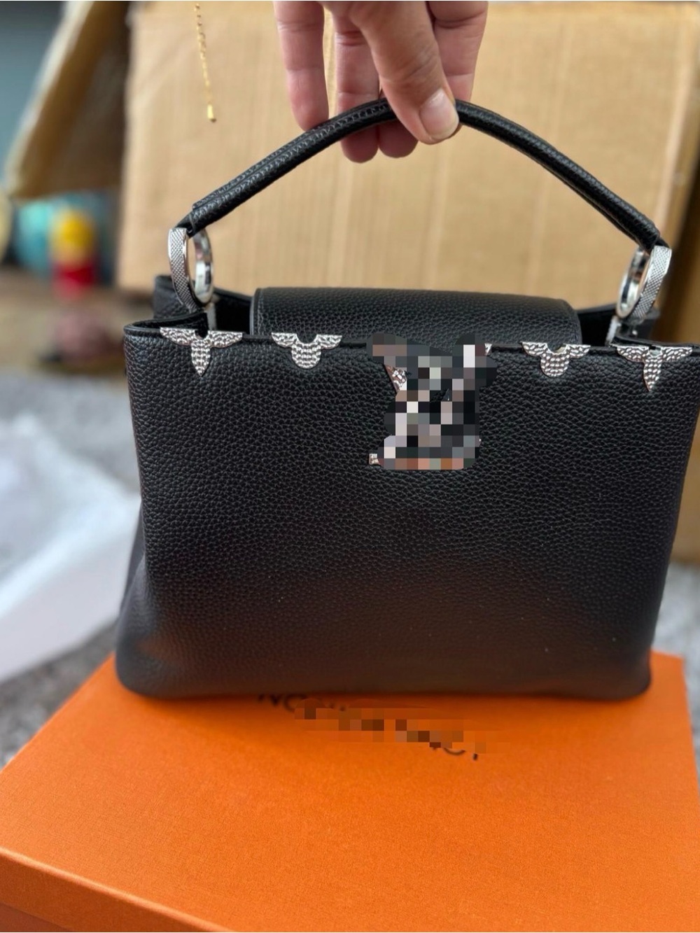 Structured Black Top-Handle Leather Bag with Silver Accents
